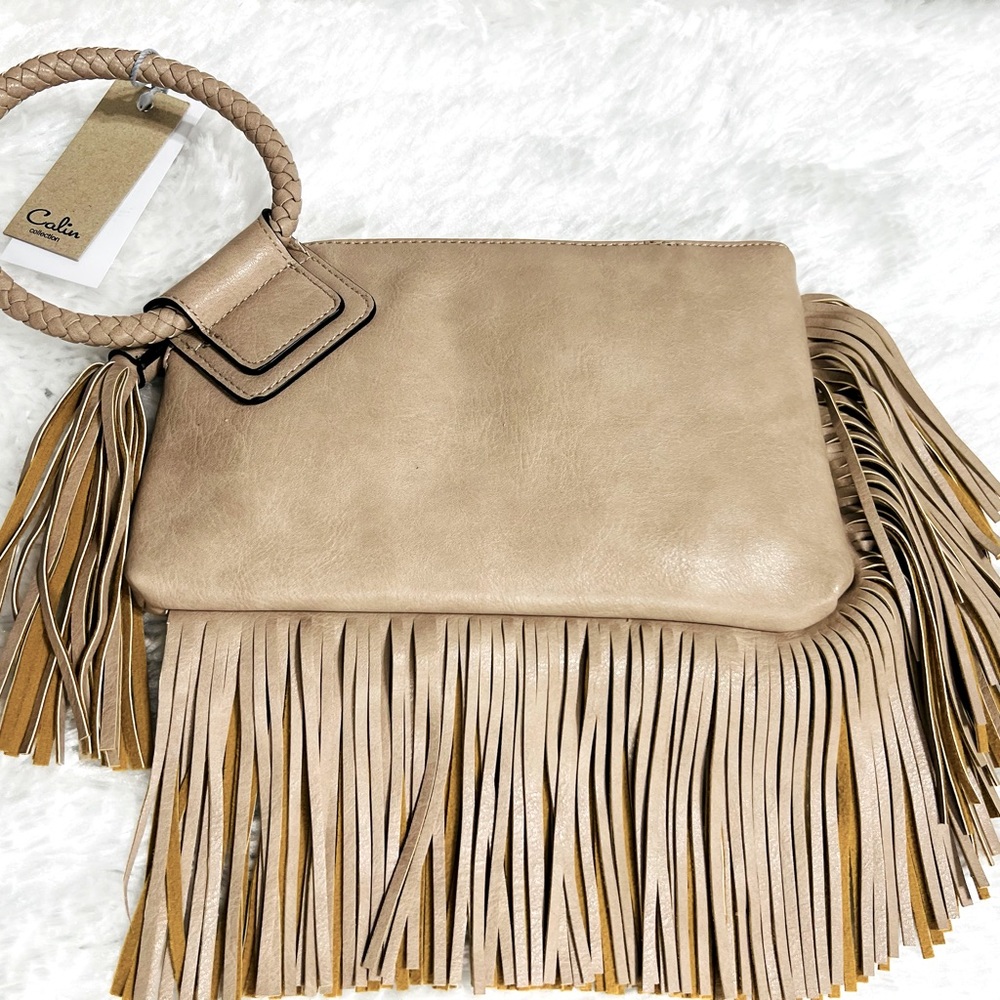 PETA Approved Tassel Wristlet! Very soft, Very similar to real leather 😍